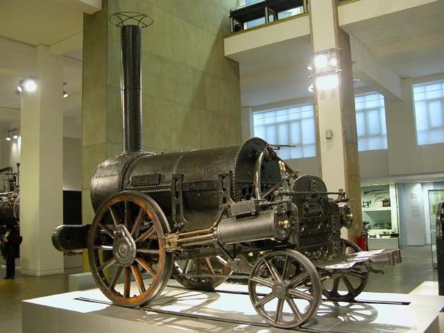 Locomotora Rocket de Stephenson (1829), una innovació en el transport durant la Revolució Industrial.